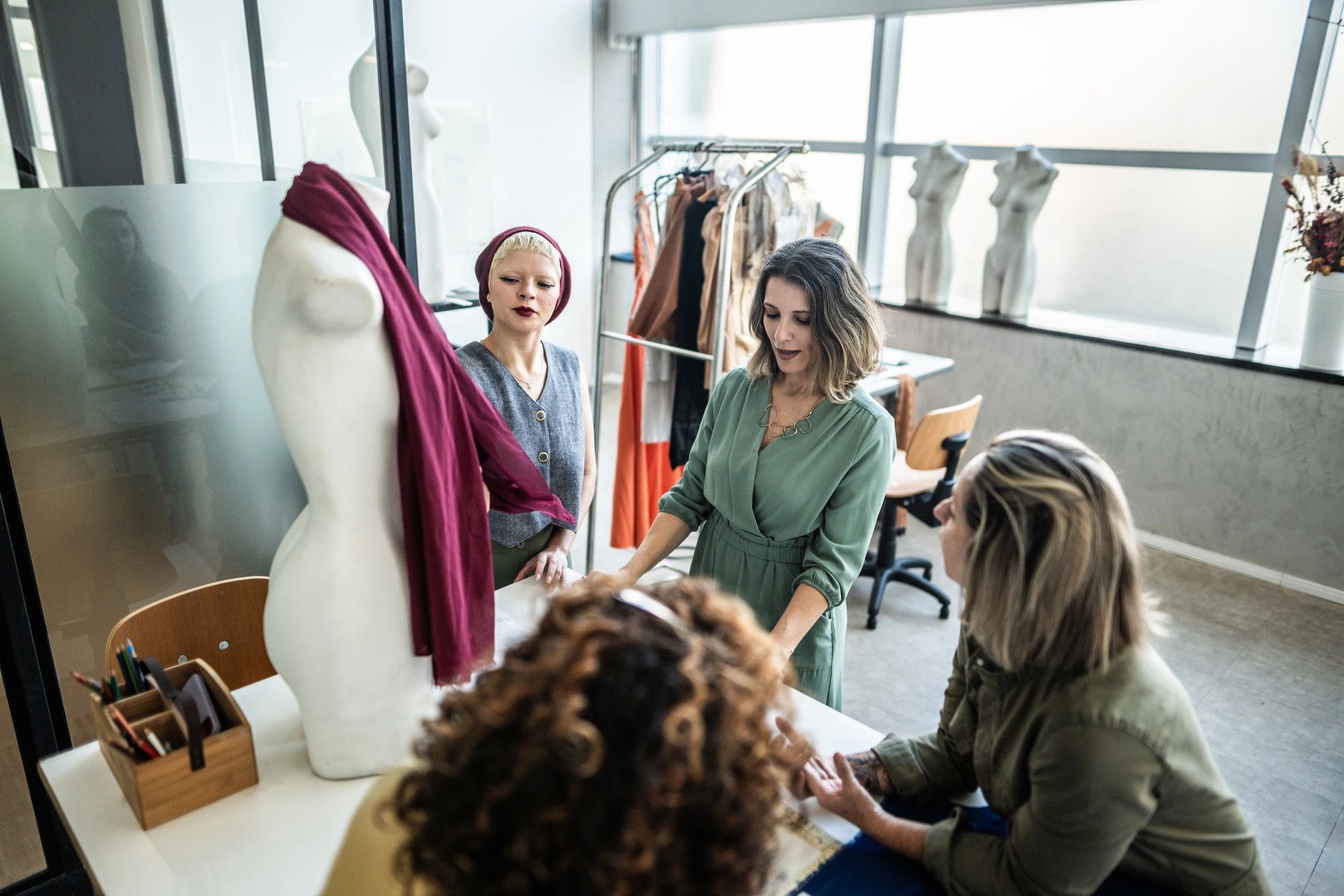 Fashion studio team meeting in an atelier