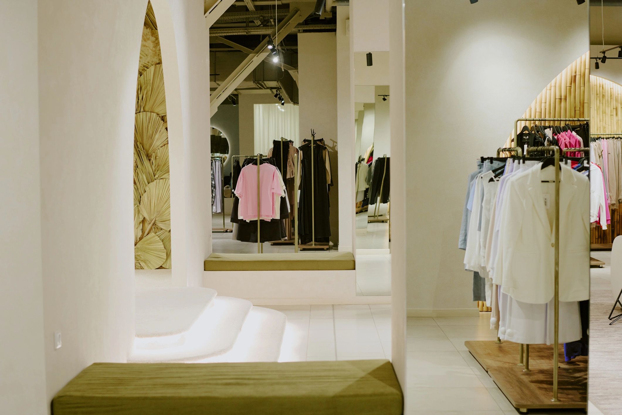 Elegant boutique interior with curated clothing displays