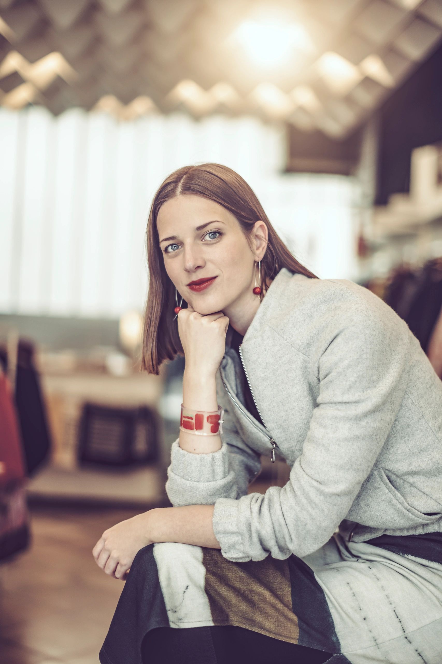 Boutique owner working inside her fashion store
